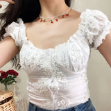 OOTDGIRL Back to School Y2k Crop Tops White Milkmaid Tops Fairycore Women Ruffled Embroidery Floral Pattern Short Puff Sleeve T-Shirt Summer