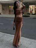 New gathered imitation leather crop top   tight slit hip skirt suit