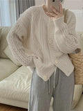 Women's twist button loose knitted cardigan